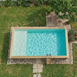 Piscina in legno AQUA 10.2 x 5.2 – H.1.45 m con spiaggia, sabbia, con supporti da cementare